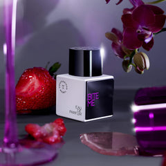 Confessions of a Rebel Bite Me EDP cap and label suggesting chic travel-ready vibe
