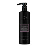 Controlled Chaos Curl Cream bottle close-up illustrating premium frizz control.