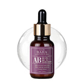 Cos De BAHA exfoliating serum bottle with pour spout for easy, controlled application.