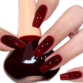 COSMOO Cherry Red Nail Polish bottle shows vibrant color and quick-dry potential.