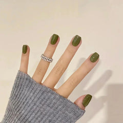 COSMOO nail polish brush applying olive shade for smooth, even coats
