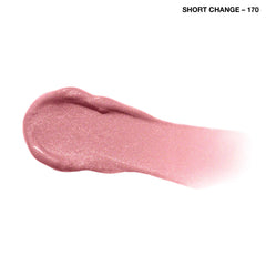 COVERGIRL Exhibitionist lip gloss swatch shows vibrant pink shine.