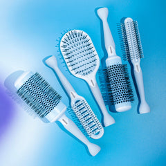 Cricket Friction Free Vent Brush with tourmaline bristles delivering moisture and shine.