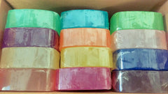 Close-up of Crystal glycerine soap bars highlighting diverse fragrances for a refreshing shower