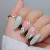 CTTHNBD almond press-on nails with green flower design for a ready-made festive manicure
