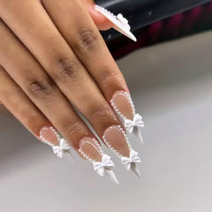 CTTHNBD long almond nails with white French tip for elegant daily wear.