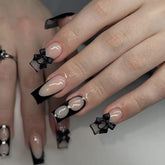 CTTHNBD press-on nails square with black French tip and bow rhinestones for chic wear.