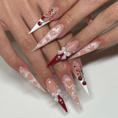 CTTHNBD stiletto nails with pink bow design for elegant at‑home manicures