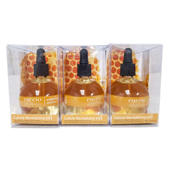 Cuccio Cuticle Oil close up shows easy to apply tip for daily care.