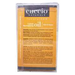 Cuccio Revitalize Cuticle Oil bottle helps achieve glossy nails after use.