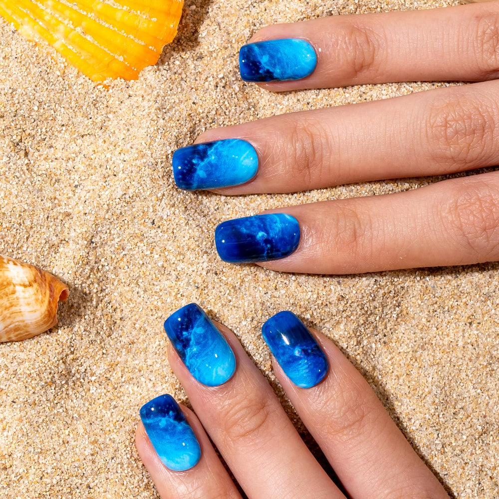 Curvlife Tip Press-On Nails blue sea design close-up showing natural fit and salon-like finish.