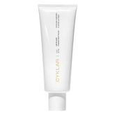CYKLAR bottle close-up showing hydrating exfoliating formula.