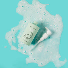 Close-up of Dabble & Dollop Honeydew Gel lather creating soft, cleansing bubbles
