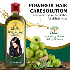 Dabur Maha Bhringraj Hair Oil pour for smooth strand application.