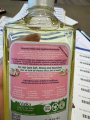 Scalp massage scene with Dabur Vatika Enriched Hair Oil showing hydration at roots.