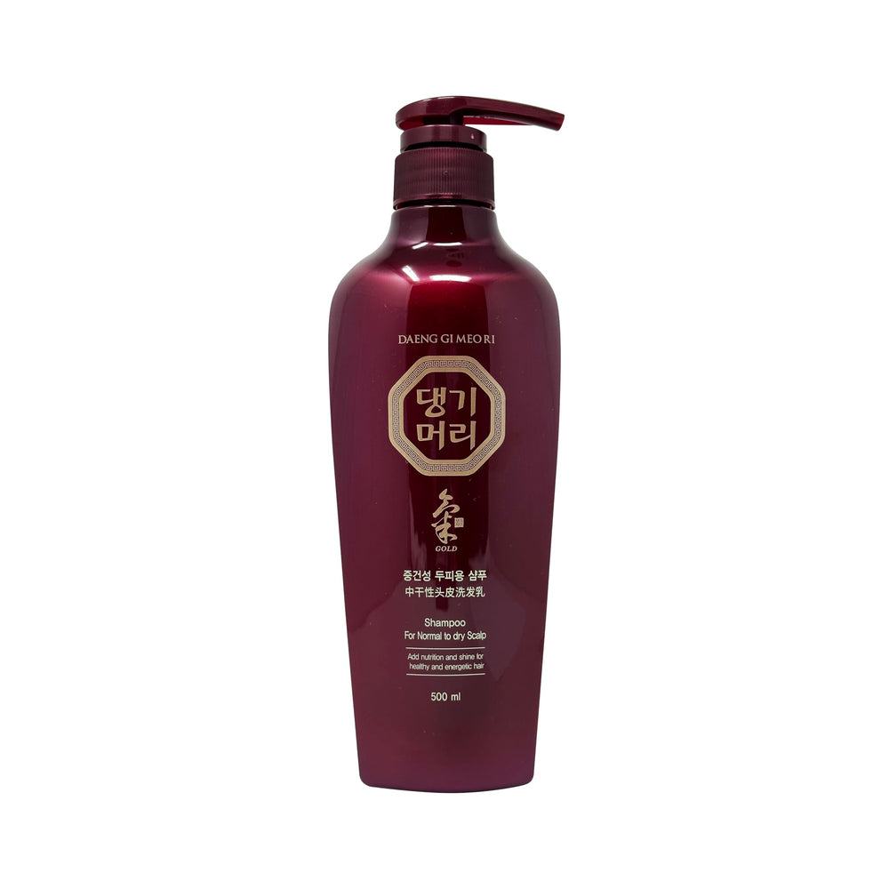 Daeng Gi Meo Ri shampoo bottle for normal to dry scalp provides moisture and nourishment.