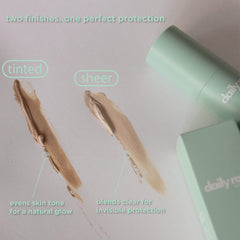 Swirl of tinted DailyRou mineral sunscreen on skin for a sheer, even look.