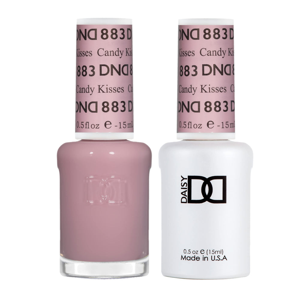 Daisy DND Candy Kisses 883 gel polish in sunset pink for a sheer manicure.