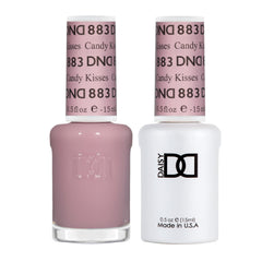 Daisy DND Candy Kisses 883 gel polish in sunset pink for a sheer manicure.
