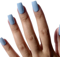 Brush stroke on nail showing glossy Aqua Blue gel polish from DAISY DND