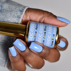 Gel polish tube in Aqua Blue from DAISY DND DC Blue Collection ready for application