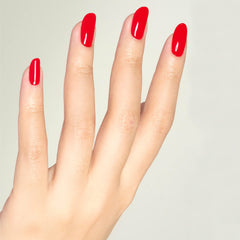 DAISY DND Ferrari Red lacquer bottle to match gel shade for a seamless manicure.