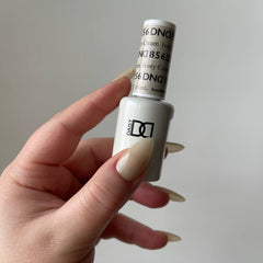 DAISY DND Ivory Cream 856 lacquer bottle complements gel color with a durable finish.
