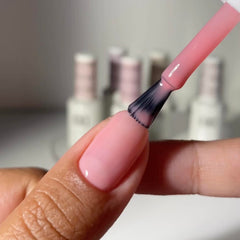 DAISY DND Rebel Rose lacquer bottle complements the gel shade for a lasting manicure.