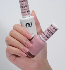 DAISY DND Sheer In The City lacquer for a cohesive nail color look.
