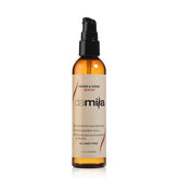Damila Repair & Shine Serum bottle pour for easy application and smoothing.