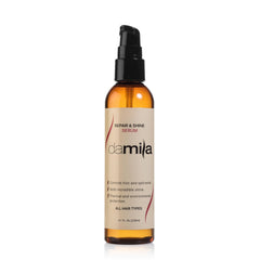 Damila Repair & Shine Serum bottle pour for easy application and smoothing.