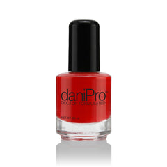 DaniPro First Kiss bottle front with bright red shade for a salon-perfect manicure.