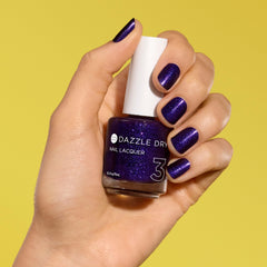 Dazzle Dry nail lacquer applied on nail for smooth coverage.