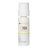 Dazzle Dry Nail Prep bottle-pump demonstrates easy, precise priming for a clean base.