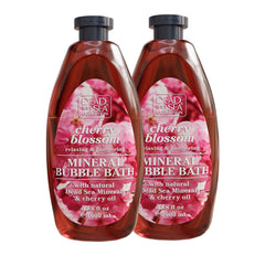 Dead Sea Collection Bubble Bath Cherry Seeds Oil bottle close-up showing rich foam for pampering.