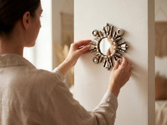 DecorContreras accent mirror adds light to living room decor.