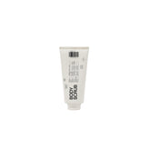 DedCool Taunt body scrub jar close-up with creamy exfoliant for smooth skin.
