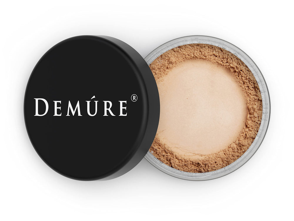 DEMÚRE Demure Mineral Finishing Powder in Tan, jar visible, helps makeup last longer while skin breathes.