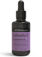 DERMAdoctor Vitamin C Oil bottle in night care setting for overnight hydration