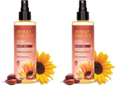 Desert Essence jojoba-sunflower body oil spray bottle delivering lightweight hydration