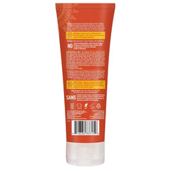 Desert Essence Mango Island Conditioner bottle supports moisture retention for softer strands.