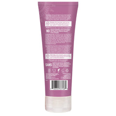 Desert Essence Red Raspberry conditioner texture close-up showing creamy richness.