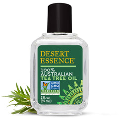 Desert Essence Tea Tree Oil dropper ready for precise blemish-prone skin use.