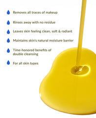 Applying DHC Deep Cleansing Oil with dry hands on a dry face.