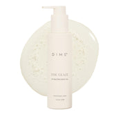 DIME Beauty Glaze Body Oil bottle demonstrates fast absorption and hydration.