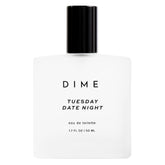 DIME Beauty Tuesday Date Night perfume bottle on a sleek vanity for an intimate evening.