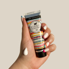 Dionis Sole Keeper Foot Cream 1oz close-up emphasizing foot hydration