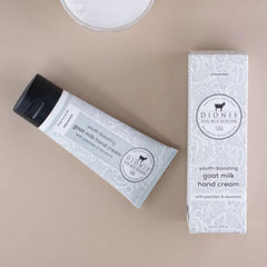 Dionis label highlights goat milk and peptides for nourishing skin.