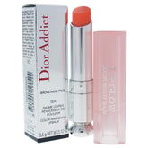 Dior Addict Glow Coral No. 004 swatch highlighting natural color and subtle glow