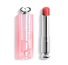 Dior Addict Lip Glow Balm 012 Rosewood adds rosy tint with hydrating shine.